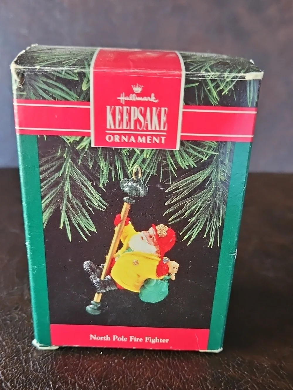 Hallmark Keepsake Ornament - North Pole Fire Fighter Santa (red, yellow, green)